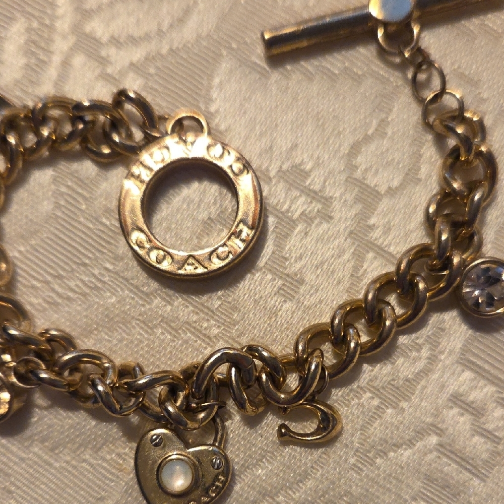 Coach Goldtone Charm Bracelet - Picture 3 of 6